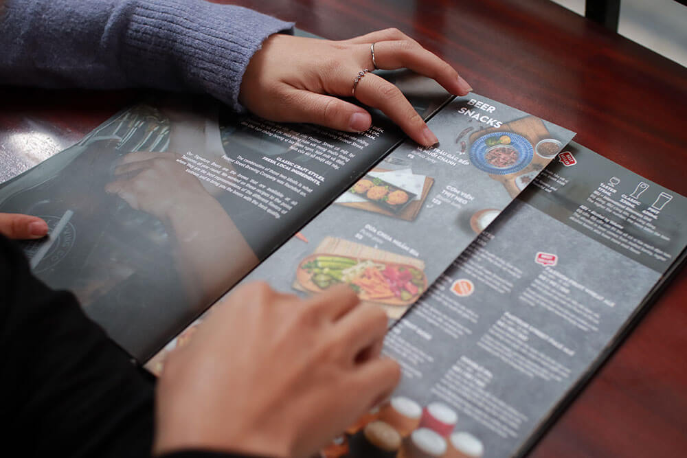 example of a printed graphic design asset: physical restaurant menu